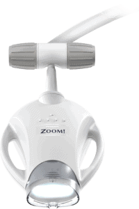 White Zoomi dental intraoral camera with rotating head and ergonomic handles for dental examination.